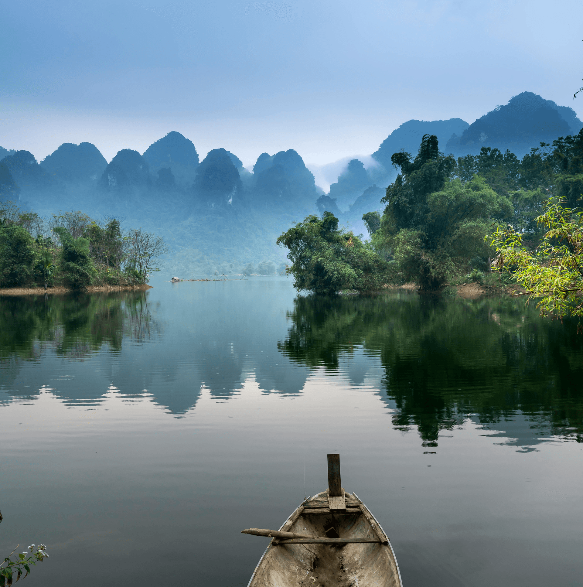 A lake image with boats inside the lake
